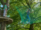 Group adventures at Tree Tops Trail - Tenby's junior and senior adventure high ropes courses