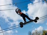 Skateboard Cross at Tree Tops Trail junior high ropes adventure - Tenby, Pembrokeshire, South West Wales