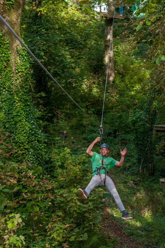 Zipline fun at Tree Tops Trail high ropes adventure - Tenby, Pembrokeshire, South West Wales