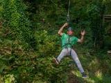 Zipline fun at Tree Tops Trail high ropes adventure - Tenby, Pembrokeshire, South West Wales